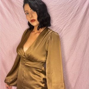 Chocolate satin v-neck mini dress with balloon sleeves. New with tags.